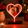 Custom Heart LED Photo Lamp glowing with a personalized couple photo on a wooden base.